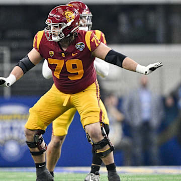 Jan 2, 2023; Arlington, Texas, USA; USC Trojans offensive lineman Jonah Monheim (79) in action during the game between the USC Trojans and the Tulane Green Wave in the 2023 Cotton Bowl at AT&T Stadium. Mandatory Credit: Jerome Miron-USA TODAY Sports