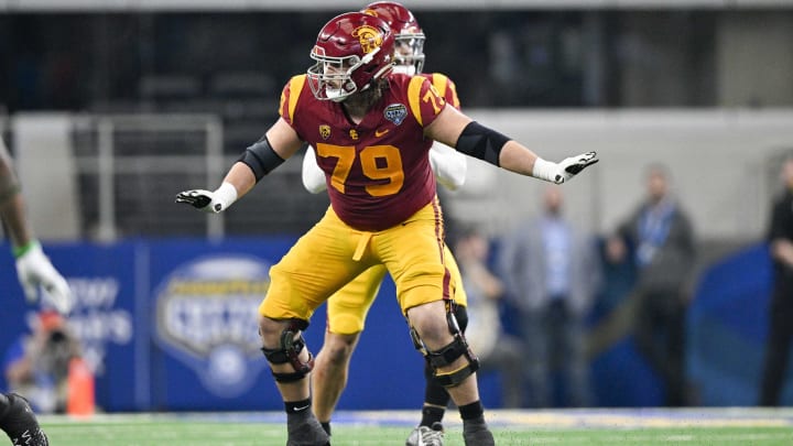 Jan 2, 2023; Arlington, Texas, USA; USC Trojans offensive lineman Jonah Monheim (79) in action during the game between the USC Trojans and the Tulane Green Wave in the 2023 Cotton Bowl at AT&T Stadium. Mandatory Credit: Jerome Miron-USA TODAY Sports