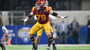 Jan 2, 2023; Arlington, Texas, USA; USC Trojans offensive lineman Jonah Monheim (79) in action during the game between the USC Trojans and the Tulane Green Wave in the 2023 Cotton Bowl at AT&T Stadium. Mandatory Credit: Jerome Miron-USA TODAY Sports