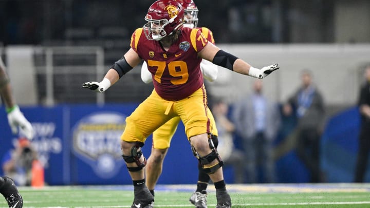 Jan 2, 2023; Arlington, Texas, USA; USC Trojans offensive lineman Jonah Monheim (79) in action during the game between the USC Trojans and the Tulane Green Wave in the 2023 Cotton Bowl at AT&T Stadium. Mandatory Credit: Jerome Miron-USA TODAY Sports