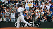 Aug 5, 2025; Seattle, Washington, USA; A fan holds up a sign after as Seattle Mariners third baseman Eugenio Suarez (28) runs the bases after hitting a 2-run home run against the Chicago White Sox during the fourth inning at T-Mobile Park. Mandatory Credit: Steven Bisig-Imagn Images
