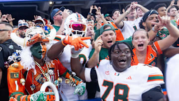 Miami Hurricanes offensive lineman Matthew McCoy (78) celebrates with fans after defeating the Gators during the season opener at Ben Hill Griffin Stadium in Gainesville, FL on Saturday, August 31, 2024 against the University of Miami Hurricanes. The Hurricanes defeated the Gators 41-17. [Doug Engle/Gainesville Sun]