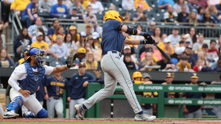 West Virginia junior Grant Hussey smashes hit 35th career home run, tying the WVU record for career home runs. 