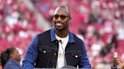 Sep 9, 2024; Santa Clara, California, USA; San Francisco 49ers former tight end Vernon Davis speaks during the 49ers hall of fame ceremony during halftime against the New York Jets at Levi's Stadium. Mandatory Credit: Darren Yamashita-Imagn Images
