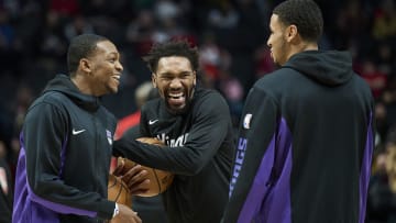 Dec 26, 2023; Portland, Oregon, USA; Sacramento Kings guard De'Aaron Fox (5), left, and guard Malik Monk (0) share a laugh with forward Keegan Murray (13), right, before a game against the Portland Trail Blazers at Moda Center. Mandatory Credit: Troy Wayrynen-USA TODAY Sports