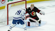 Apr 26, 2025; Ottawa, Ontario, CAN; Ottawa Senators goalie Linus Ullmark (35) makes a save on a shot from Toronto Maple Leafs right wing Pontus Holmberg (29) in game four of the first round of the 2025 Stanley Cup Playoffs at Canadian Tire Centre. Mandatory Credit: Marc DesRosiers-Imagn Images