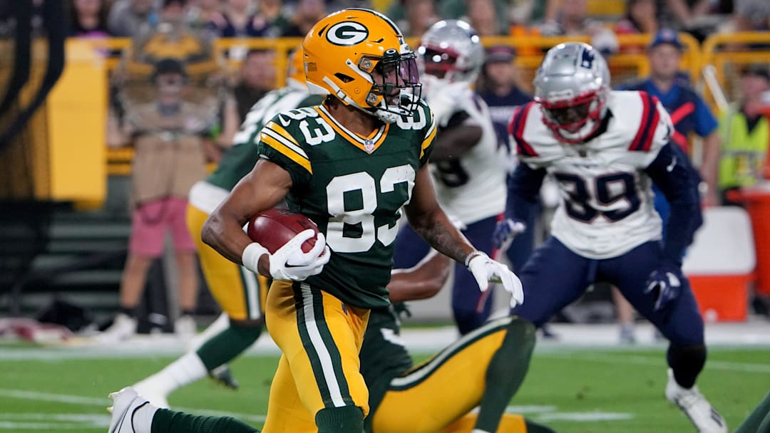 Green Bay Packers wide receiver Samori Toure (83) returns a kicked during the third quarter of their preseason game against the New England Patriots Saturday, August 19, 2023 at Lambeau Field in Green Bay, Wis.