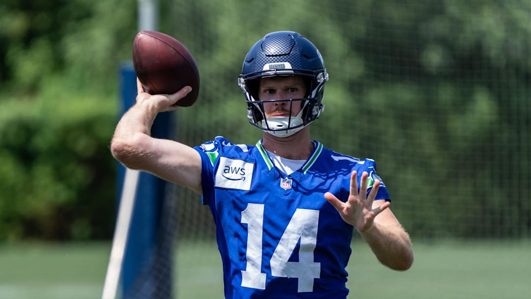 Jun 11, 2025; Renton, WA, USA; Seattle Seahawks quarterback Sam Darnold (14) passes the ball during mini-camp at Virginia Mason Athletic Center. Mandatory Credit: Stephen Brashear-Imagn Images