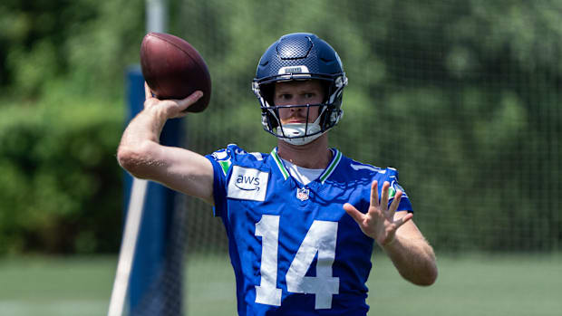 Jun 11, 2025; Renton, WA, USA; Seattle Seahawks quarterback Sam Darnold (14) passes the ball during mini-camp at Virginia Mas