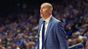 Nov 19, 2024; Lexington, Kentucky, USA; Kentucky Wildcats head coach Mark Pope celebrates from the sideline during the first half against the Lipscomb Bisons at Rupp Arena at Central Bank Center. Mandatory Credit: Jordan Prather-Imagn Images