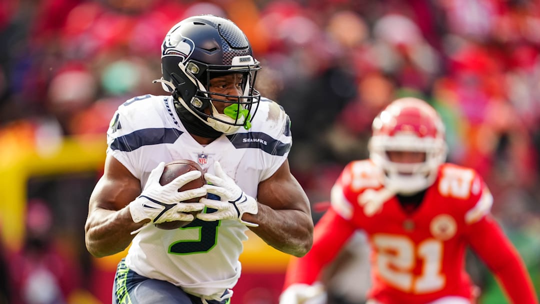 Dec 24, 2022; Kansas City, Missouri, USA; Seattle Seahawks running back Kenneth Walker III (9) runs the ball during the second half against the Kansas City Chiefs at GEHA Field at Arrowhead Stadium. Mandatory Credit: Jay Biggerstaff-Imagn Images