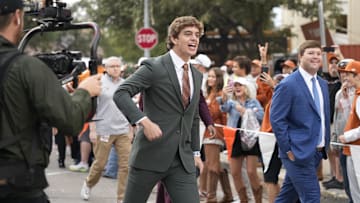 Nov 1, 2025; Austin, Texas, USA; Texas Longhorns quarterback Arch Manning (16) rouses the fans before a game against the Vanderbilt Commodores.