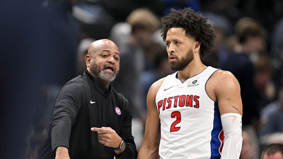 Dec 18, 2025; Dallas, Texas, USA; Detroit Pistons head coach J.B. Bickerstaff talks with guard Cade Cunningham (2) during the first quarter against the Dallas Mavericks at the American Airlines Center. Mandatory Credit: Jerome Miron-Imagn Images