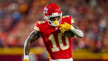 Oct 12, 2025; Kansas City, Missouri, USA; Kansas City Chiefs running back Isiah Pacheco (10) runs the ball during the first half against the Detroit Lions at GEHA Field at Arrowhead Stadium. Mandatory Credit: Jay Biggerstaff-Imagn Images