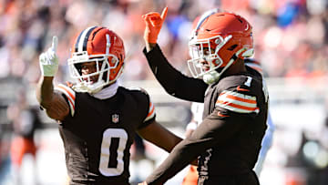 Oct 27, 2024; Cleveland, Ohio, USA; Cleveland Browns cornerback Greg Newsome II (0) and safety Juan Thornhill (1) celebrate after a pass break up during the first half against the Baltimore Ravens at Huntington Bank Field. Mandatory Credit: Ken Blaze-Imagn Images
