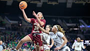Jan 11, 2024; South Bend, Indiana, USA; Boston College Eagles forward Teya Sidberry (32) goes up for a shot as Notre Dame Fighting Irish guard Hannah Hidalgo (3) defends in the first half at the Purcell Pavilion. Mandatory Credit: Matt Cashore-Imagn Images