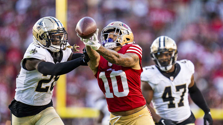 August 18, 2024; Santa Clara, California, USA; San Francisco 49ers wide receiver Ronnie Bell (10) misses a catch defended by New Orleans Saints cornerback Rejzohn Wright (28) during the third quarter at Levi's Stadium. Mandatory Credit: Kyle Terada-Imagn Images
