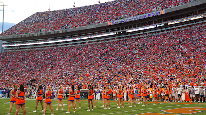 Clemson cheerleaders pause for the National Anthem before the game with Clemson and Louisiana State University at Memorial Stadium in Clemson, S.C. Saturday, August 30, 2025.