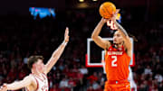 Former Illinois Fighting Illini guard Dra Gibbs-Lawhorn (2) shoots a three-point shot against Nebraska Cornhuskers guard Connor Essegian (0) during the second half at Pinnacle Bank Arena. 