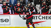 Feb 1, 2025; Ottawa, Ontario, CAN; Ottawa Senators defenseman Jake Sanderson (85) celebrates with teammates after scoring a goal in the third period against the Minnesota Wild at the Canadian Tire Centre. Mandatory Credit: Marc DesRosiers-Imagn Images