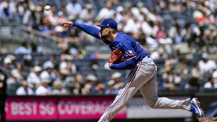 Aug 10, 2024; Bronx, New York, USA; Texas Rangers pitcher Nathan Eovaldi (17) pitches against the New York Yankees during the first inning at Yankee Stadium. Mandatory Credit: John Jones-Imagn Images