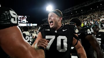 Sep 6, 2025; East Lansing, Michigan, USA; Michigan State offensive lineman Luka Vincic (70) celebrates a double-overtime victory over Boston College at Spartan Stadium. Mandatory Credit: Brendan Mullin-Imagn Images