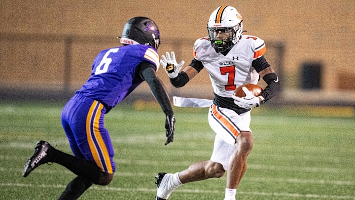 Valley’s Jayden McGregory (7) looks to get past his defender, Johnston's Caleb Gbarjolo (6), on Nov. 7, 2025, at Johnston High School. Valley’s Jayden McGregory (7) looks to get past his defender, Johnston's Caleb Gbarjolo (6), on Nov. 7, 2025, at Johnston High School.