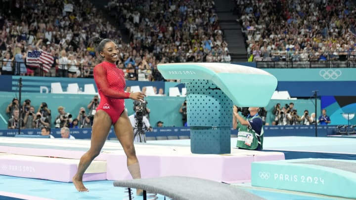 Aug 3, 2024; Paris, France; Simone Biles of the United States reacts after competing on the vault on the first day of gymnastics event finals during the Paris 2024 Olympic Summer Games at Bercy Arena. Mandatory Credit: Kyle Terada-USA TODAY Sports