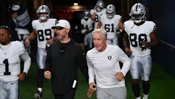 Aug 7, 2025; Seattle, Washington, USA; Las Vegas Raiders head coach Pete Carroll runs out of the tunnel before the second half against the Seattle Seahawks at Lumen Field. Mandatory Credit: Steven Bisig-Imagn Images
