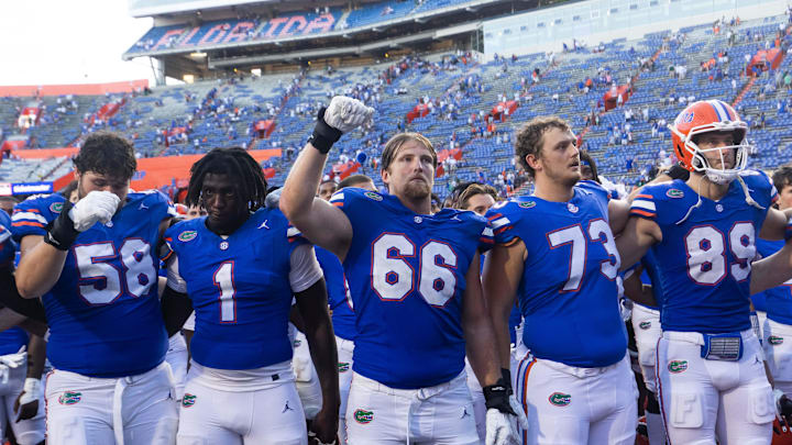 Florida gathered in the North end zone for the song 
“We are the Boys” during the season opener at Ben Hill Griffin Stadium in Gainesville, FL on Saturday, August 31, 2024 against the University of Miami Hurricanes. The Hurricanes defeated the Gators 41-17. [Doug Engle/Gainesville Sun]