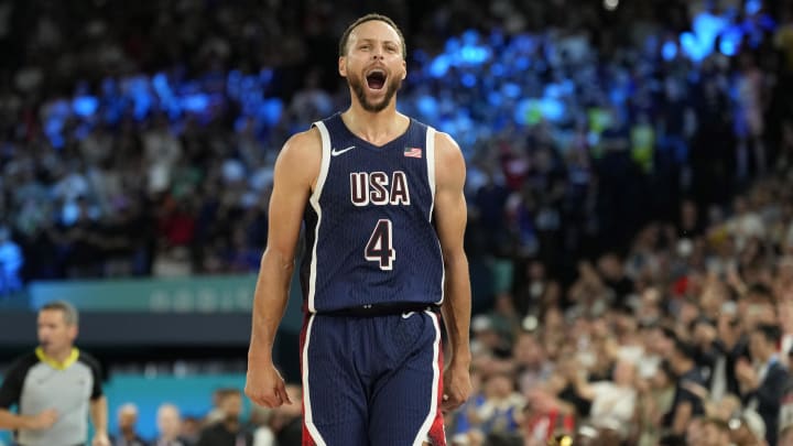 Aug 10, 2024: United States shooting guard Stephen Curry celebrates in the second half against France in the men's basketball gold medal game during the Paris 2024 Olympic Summer Games at Accor Arena.