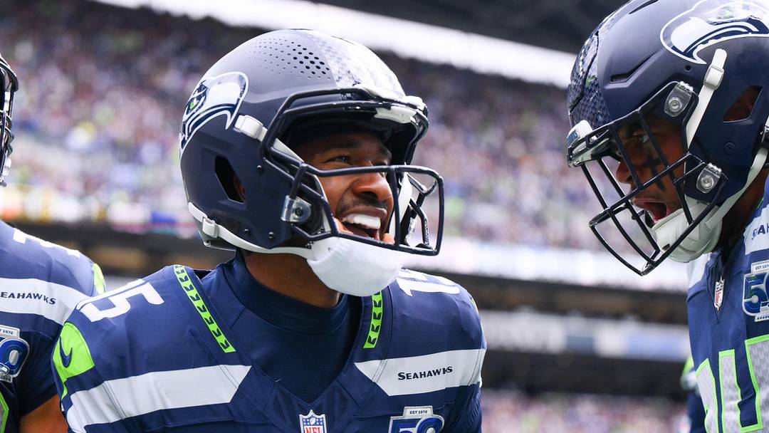 Sep 21, 2025; Seattle, Washington, USA; Seattle Seahawks wide receiver Tory Horton (15) celebrates after scoring a 95-yard punt return for a touchdown against the New Orleans Saints during the first quarter at Lumen Field.