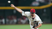 Sep 15, 2025; Phoenix, Arizona, USA; Arizona Diamondbacks pitcher Zac Gallen (23) pitches against the San Francisco Giants during the first inning at Chase Field. Mandatory Credit: Joe Camporeale-Imagn Images