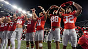 Sept. 7, 2024; Columbus, Ohio, USA;
Ohio State Buckeyes running back TreVeyon Henderson (32) sings “Carmen Ohio” with teammates following a 56-0 win over Western Michigan on Saturday at Ohio Stadium.