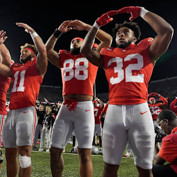 Sept. 7, 2024; Columbus, Ohio, USA;
Ohio State Buckeyes running back TreVeyon Henderson (32) sings “Carmen Ohio” with teammates following a 56-0 win over Western Michigan on Saturday at Ohio Stadium.