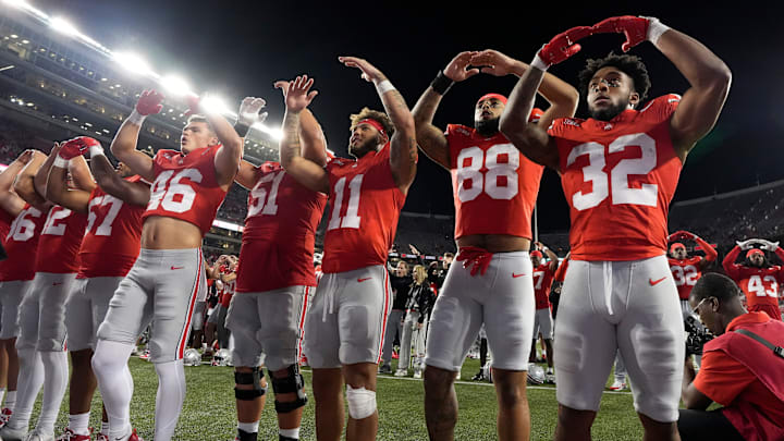 Sept. 7, 2024; Columbus, Ohio, USA;
Ohio State Buckeyes running back TreVeyon Henderson (32) sings “Carmen Ohio” with teammates following a 56-0 win over Western Michigan on Saturday at Ohio Stadium.