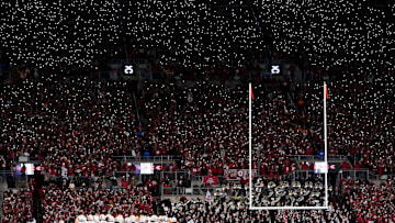 Tennessee in huddle at Ohio Stadium during the NCAA college football playoff game against Ohio State on Saturday, Dec. 21, 2024, in Columbus, Ohio.