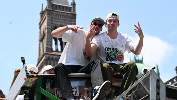 Boston Celtics guard Payton Pritchard (11) poses for a picture during the 2024 NBA Championship parade in Boston. 