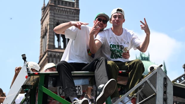 Boston Celtics guard Payton Pritchard (11) poses for a picture during the 2024 NBA Championship parade in Boston.