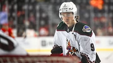 Apr 14, 2024; Calgary, Alberta, CAN; Arizona Coyotes right wing Clayton Keller (9) warms up before a game against the Calgary Flames at Scotiabank Saddledome. Mandatory Credit: Brett Holmes-USA TODAY Sports