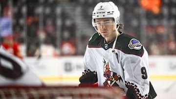 Apr 14, 2024; Calgary, Alberta, CAN; Arizona Coyotes right wing Clayton Keller (9) warms up before a game against the Calgary Flames at Scotiabank Saddledome. Mandatory Credit: Brett Holmes-Imagn Images