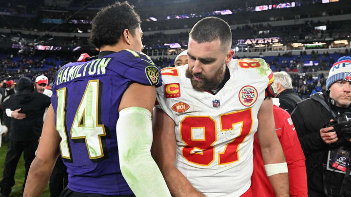 Jan 28, 2024; Baltimore, Maryland, USA; Kansas City Chiefs tight end Travis Kelce (87) greets Baltimore Ravens safety Kyle Hamilton (14) after their AFC Championship football game at M&T Bank Stadium. Mandatory Credit: Tommy Gilligan-USA TODAY Sports