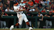 Mar 14, 2025; Sarasota, Florida, USA;  Baltimore Orioles outfielder Tyler O'Neill (9) singles during the fourth inning against the Minnesota Twins at Ed Smith Stadium. Mandatory Credit: Kim Klement Neitzel-Imagn Images