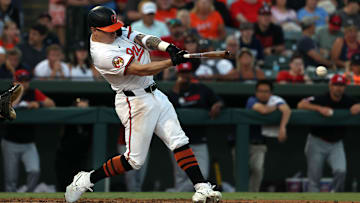 Mar 14, 2025; Sarasota, Florida, USA;  Baltimore Orioles outfielder Tyler O'Neill (9) singles during the fourth inning against the Minnesota Twins at Ed Smith Stadium. Mandatory Credit: Kim Klement Neitzel-Imagn Images