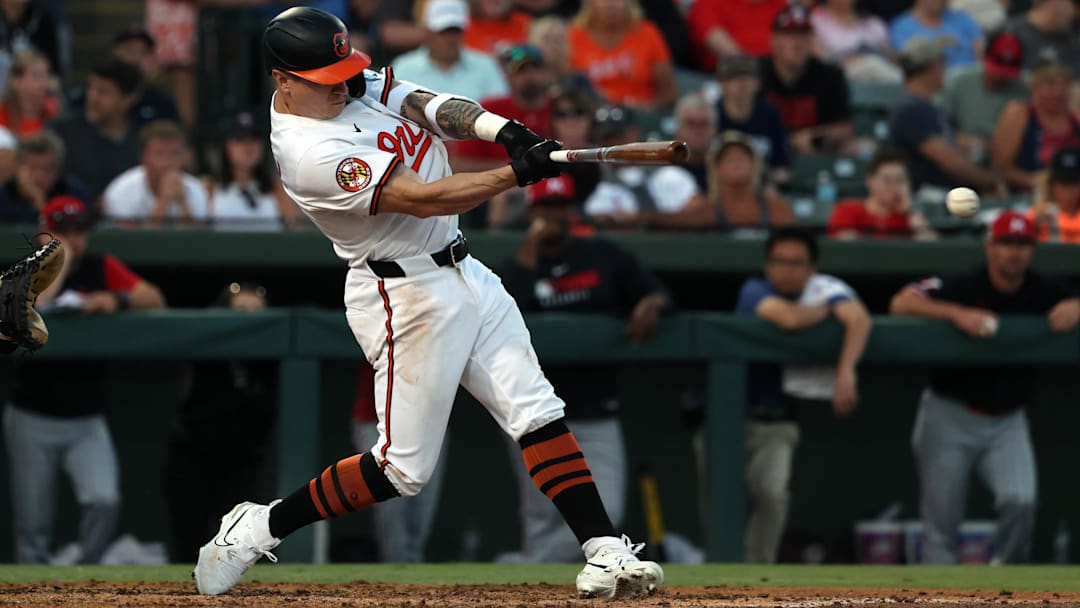 Mar 14, 2025; Sarasota, Florida, USA; Baltimore Orioles outfielder Tyler O'Neill (9) singles during the fourth inning against the Minnesota Twins at Ed Smith Stadium. Mandatory Credit: Kim Klement Neitzel-Imagn Images