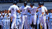 May 30, 2025; Oxford, MS, USA; Georgia Tech Yellowjackets catcher Vahn Lackey (25), shortstop Kyle Lodise (2), first base Kent Schmidt (10) and outfielder Caleb Daniel (6) react with outfielder Alex Hernandez (4) after a three run home run during the first inning against the Western Kentucky Hilltoppers. Mandatory Credit: Petre Thomas-Imagn Images