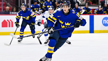 Victor Eklund (18) skates for Sweden as they take on Finland in the Semifinals at the 2025 IIHF World Junior Championship.