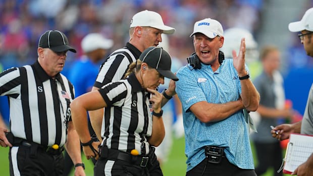 Aug 29, 2024; Kansas City, Kansas, USA; Kansas Jayhawks head coach Lance Leipold talks with officials during the first half a