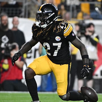Aug 16, 2025; Pittsburgh, Pennsylvania, USA; Pittsburgh Steelers running back Trey Sermon (27) celebrates a touchdown  against the Tampa Bay Buccaneers during the second half at Acrisure Stadium. Mandatory Credit: Barry Reeger-Imagn Images