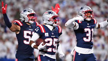 New England Patriots cornerback Marcus Jones (25) reacts after an interception against the Buffalo Bills during the second half at Highmark Stadium. Mandatory Credit: Mark Konezny-Imagn Images